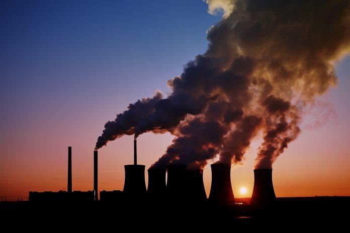 coal fired power station silhouette at sunset, Pocerady, Czech republic critical infrastructure attacks