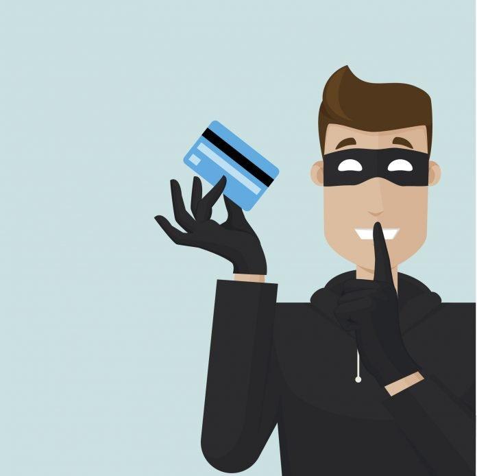 Thief with finger in front of mouth
