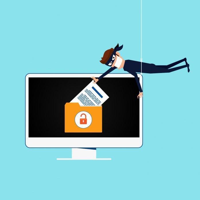 Thief. Hacker stealing sensitive data as passwords from a personal computer useful for anti phishing and internet viruses campaigns. concept hacking internet social network. Timehop data breach