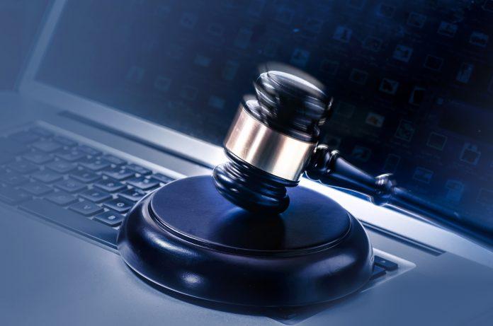 Law legal issue concept image gavel on computer EU Internet Content Law