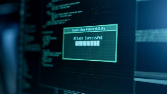 Display Showing Stages of Hacking in Progress: Exploiting Vulnerability, Executing and Granted Access. Onsite hacking