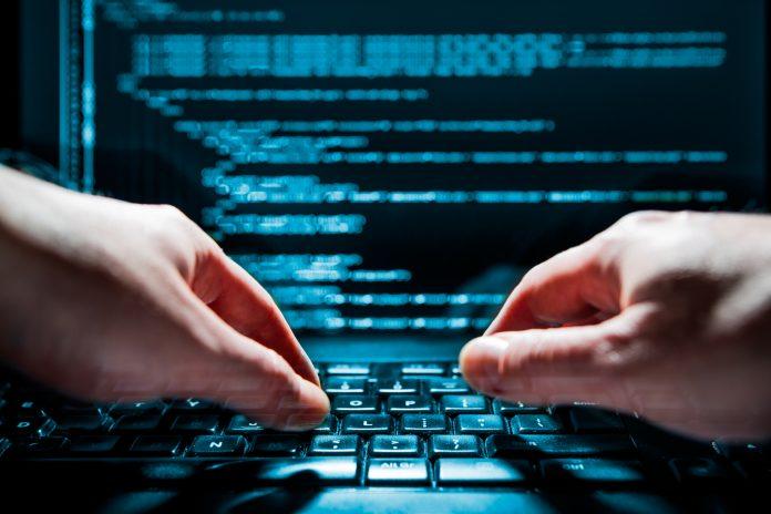 Computer crime concept Newspaper cyberattack
