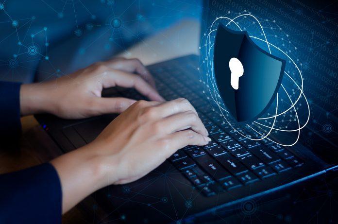 Press enter button on the keyboard computer Shield cyber Key lock security system abstract technology world digital link cyber security on hi tech Dark blue background, Enter password to log in. lock finger Keyboard Data Privacy Day